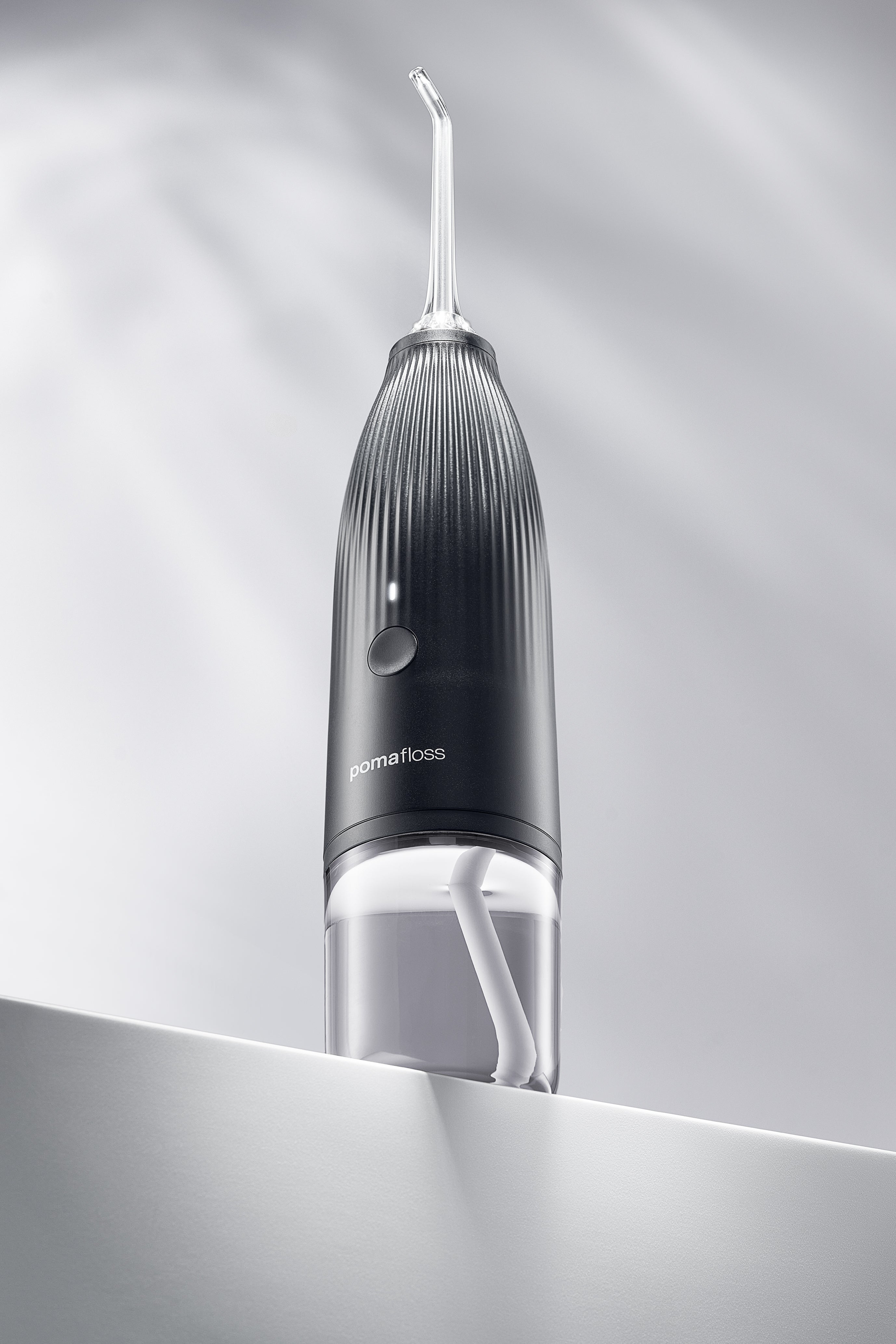 Pomafloss Model 1.0 - Portable Water Flosser