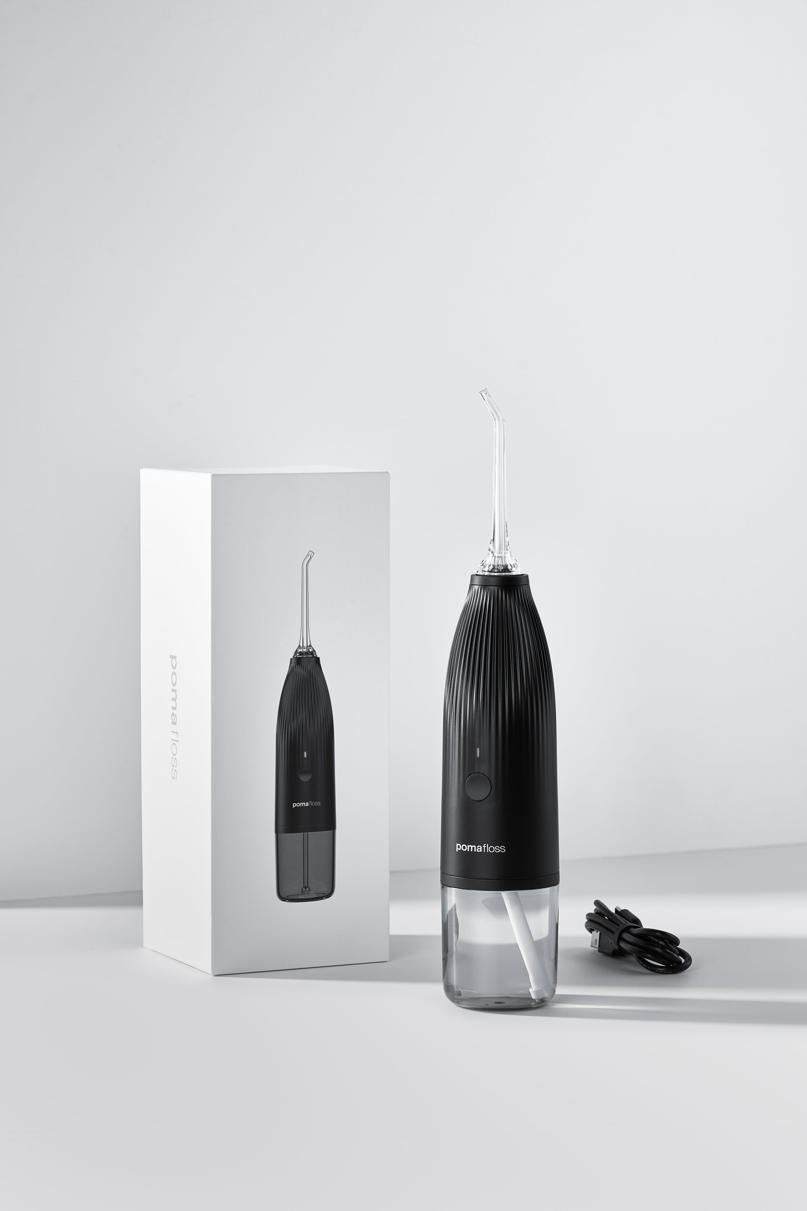 Pomafloss Model 1.0 - Portable Water Flosser